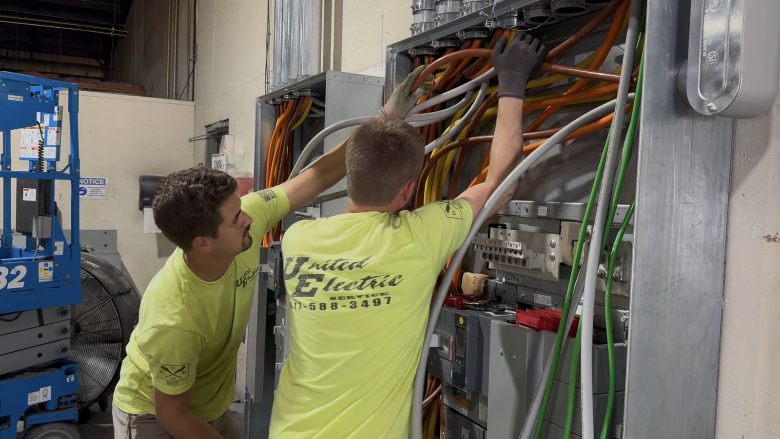 United Electric Service electricians pulling feeders into commercial switchgear in Lebanon, Missouri